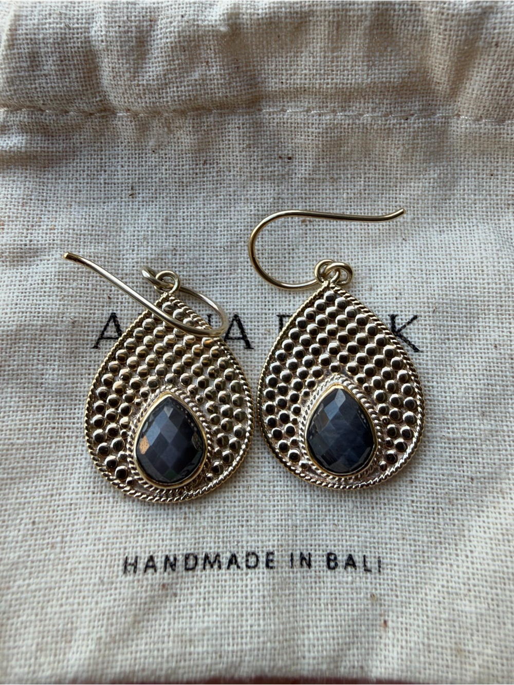Anna Beck Gold Teardrop Earrings with dark gray Stones
